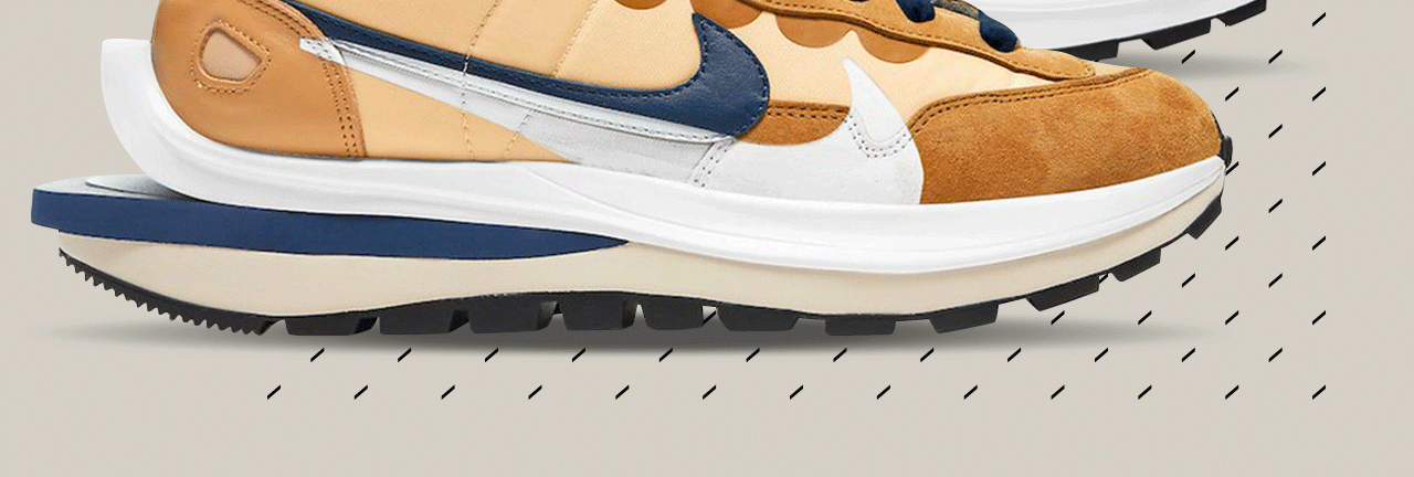 The Nike sacai Vaporwaffle Sesame Blue Void & Dark Iris